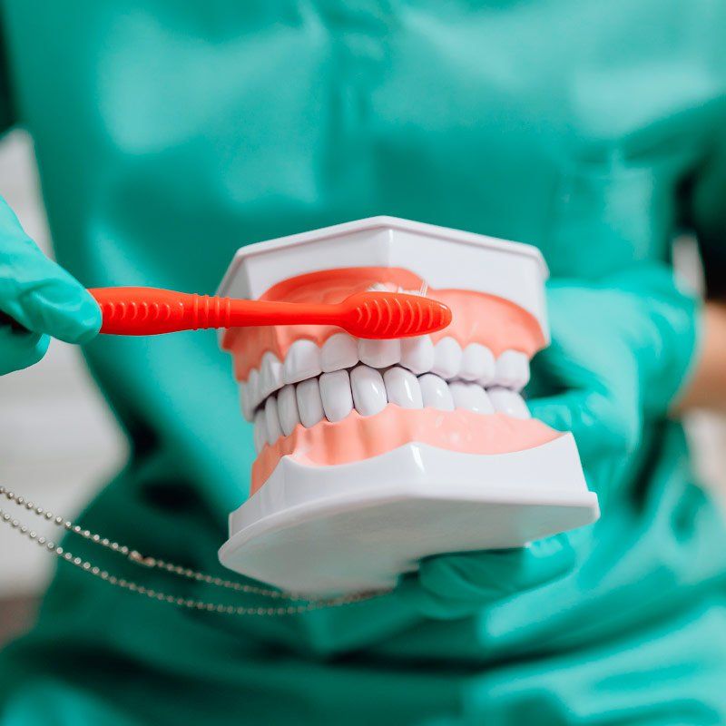 Salud bucal con FE Dental