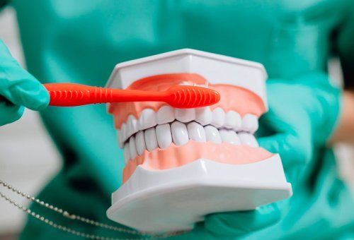 Salud bucal con FE Dental